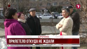 Облицовочная плита рухнула на авто в Алматы